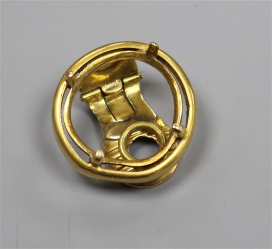 A Van Cleef & Arpels gilt metal ear clip (lacking stone?), 21mm.